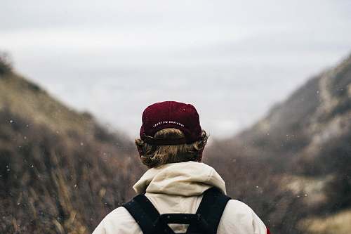 united states selective focus photography of person viewing mountains cap